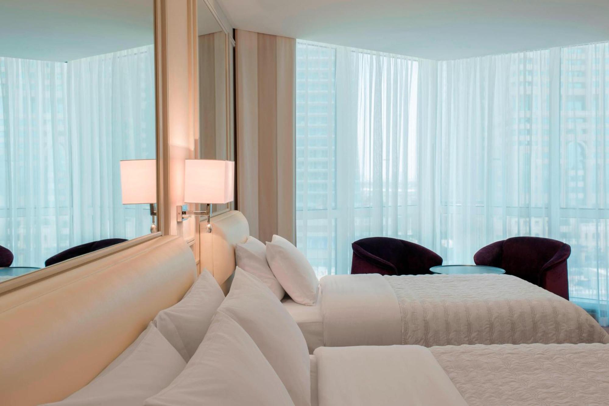 Le Meridien Mina Seyahi Beach Resort & Waterpark Dubai Ngoại thất bức ảnh A bedroom at the hotel